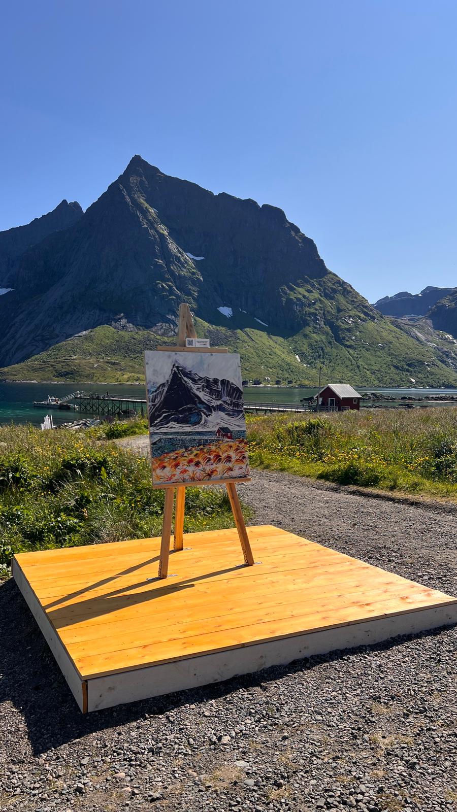Vindstad installation: paintings displayed in the snowy fjord landscape